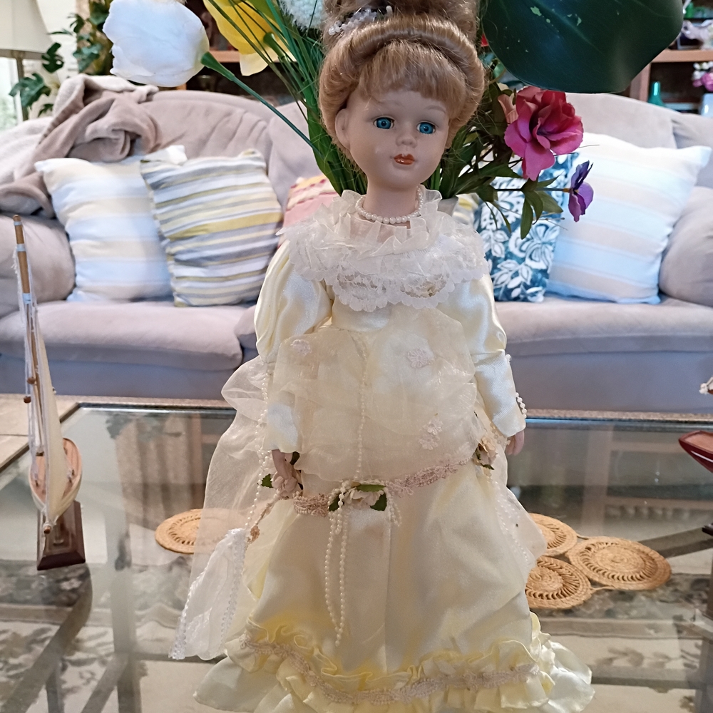 Elegant Yellow Doll with Lace Dress